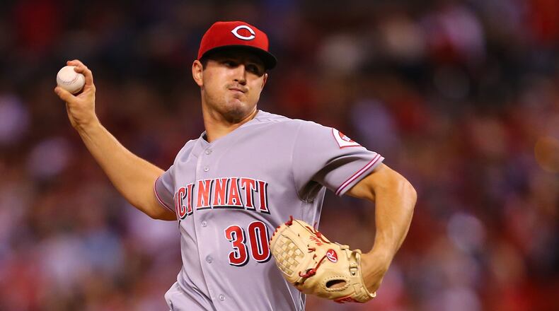 Tyler Mahle of the Cincinnati Reds pitches against the St. Louis Cardinals at Busch Stadium late last season. (Photo by Dilip Vishwanat/Getty Images)