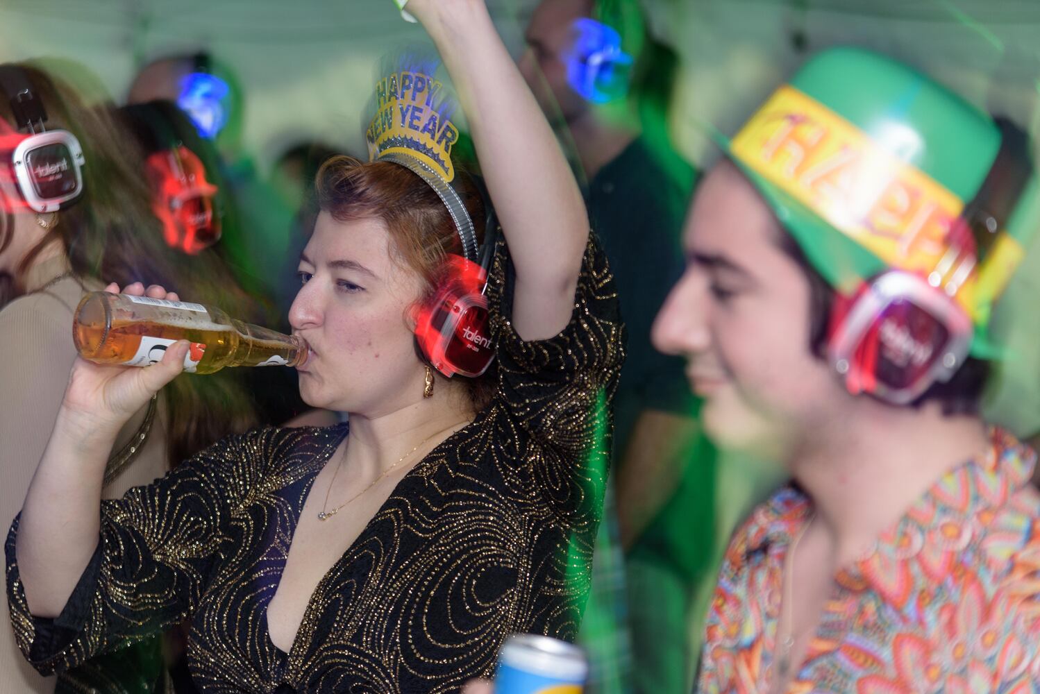 PHOTOS: Did we spot you at Dayton's New Year's Eve Ball Drop and Silent Disco at Yellow Cab Tavern?