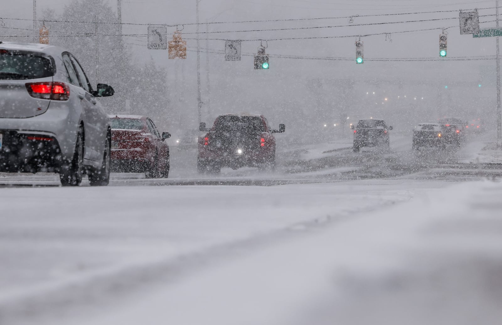 The first snow of the season falls on Ohio 73 Monday morning, Nov. 10, 2025 in Franklin. NICK GRAHAM/STAFF