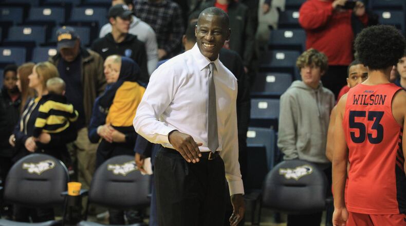 Dayton’s Anthony Grant smiles after a victory against La Salle on Thursday, Jan. 2, 2020, at Tom Gola Arena in Philadelphia. David Jablonski/Staff