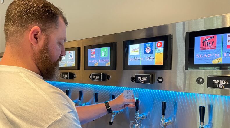 The Slap’n Lizard, a self-pour tap house in West Carrollton, is officially opening its doors to the public on Wednesday, June 28 from 3 p.m. to 10 p.m. through a soft opening. NATALIE JONES/STAFF