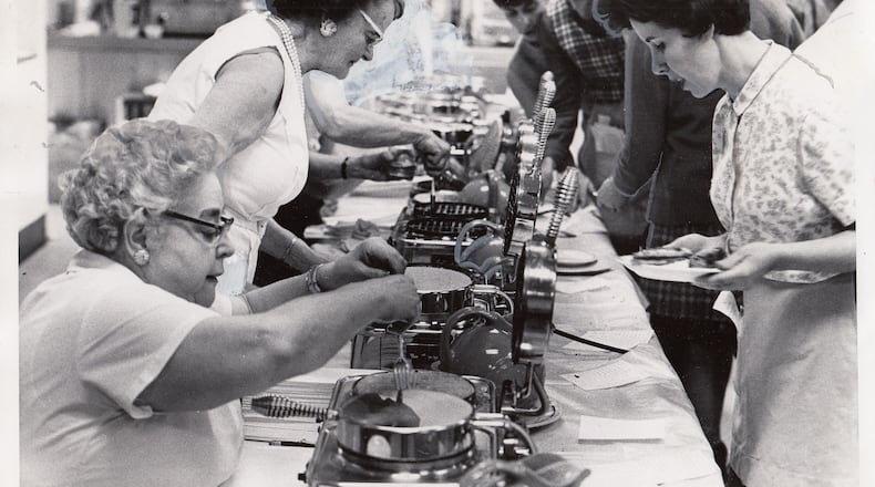 Christ Episcopal Church’s Women of the Parochial Society, one of eight women’s groups at the church at the time, launched Waffle Shop in 1929. The holiday fundraiser has grown over the years.
Photo: Dec. 3, 1969 by Al Wilson, Journal Herald.