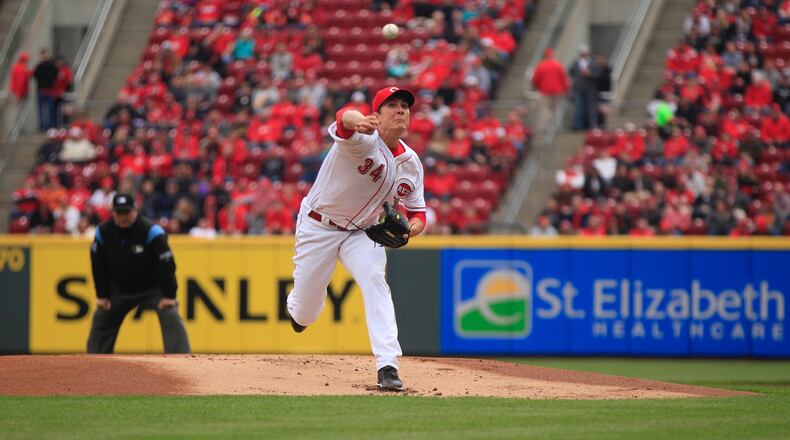 Reds starter Homer Bailey pitches against the Nationals on Friday, March 30, 2018, at Great American Ball Park in Cincinnati. David Jablonski/Staff