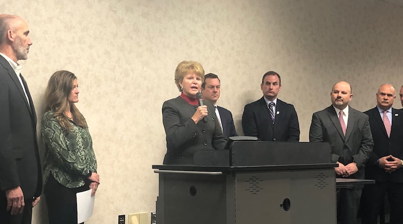 Dayton Public Schools Superintendent Elizabeth Lolli expresses her opposition to the growth of Ohio’s private school voucher program, as superintendents of several other Montgomery County school districts look on Friday, Jan. 24, 2020 at the Montgomery County Educational Service Center. JEREMY P. KELLEY / STAFF