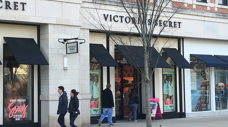 Shoppers pass by the Victoria’s Secret at The Greene Town Center in Beavercreek. KARA DRISCOLL/STAFF