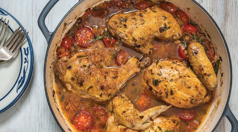 Saturday’s Vinegar Chicken With Tomatoes is served with rice. Contributed by Noah Fecks