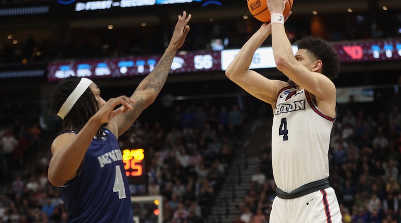 Dayton's Koby Brea makes a game-tying 3-pointer in the final minutes against Nevada in the first round of the NCAA tournament on Thursday, March 21, 2024, at the Delta Center in Salt Lake City, Utah. David Jablonski/Staff