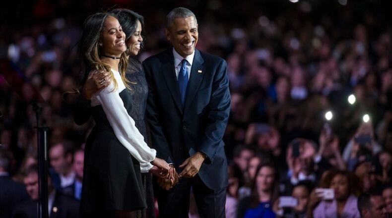 President Obama is joined by Michelle and Malia after his farewell address at McCormick Place in Chicago on Tuesday, Jan. 10, 2017. (Brian Cassella/Chicago Tribune/TNS)