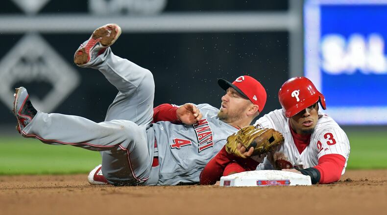 PHILADELPHIA, PA - APRIL 11: Aaron Altherr #23 of the Philadelphia Phillies gets picked off at second base by Cliff Pennington #4 of the Cincinnati Reds in the 10th inning at Citizens Bank Park on April 11, 2018 in Philadelphia, Pennsylvania. The Phillies won 4-3. (Photo by Drew Hallowell/Getty Images)