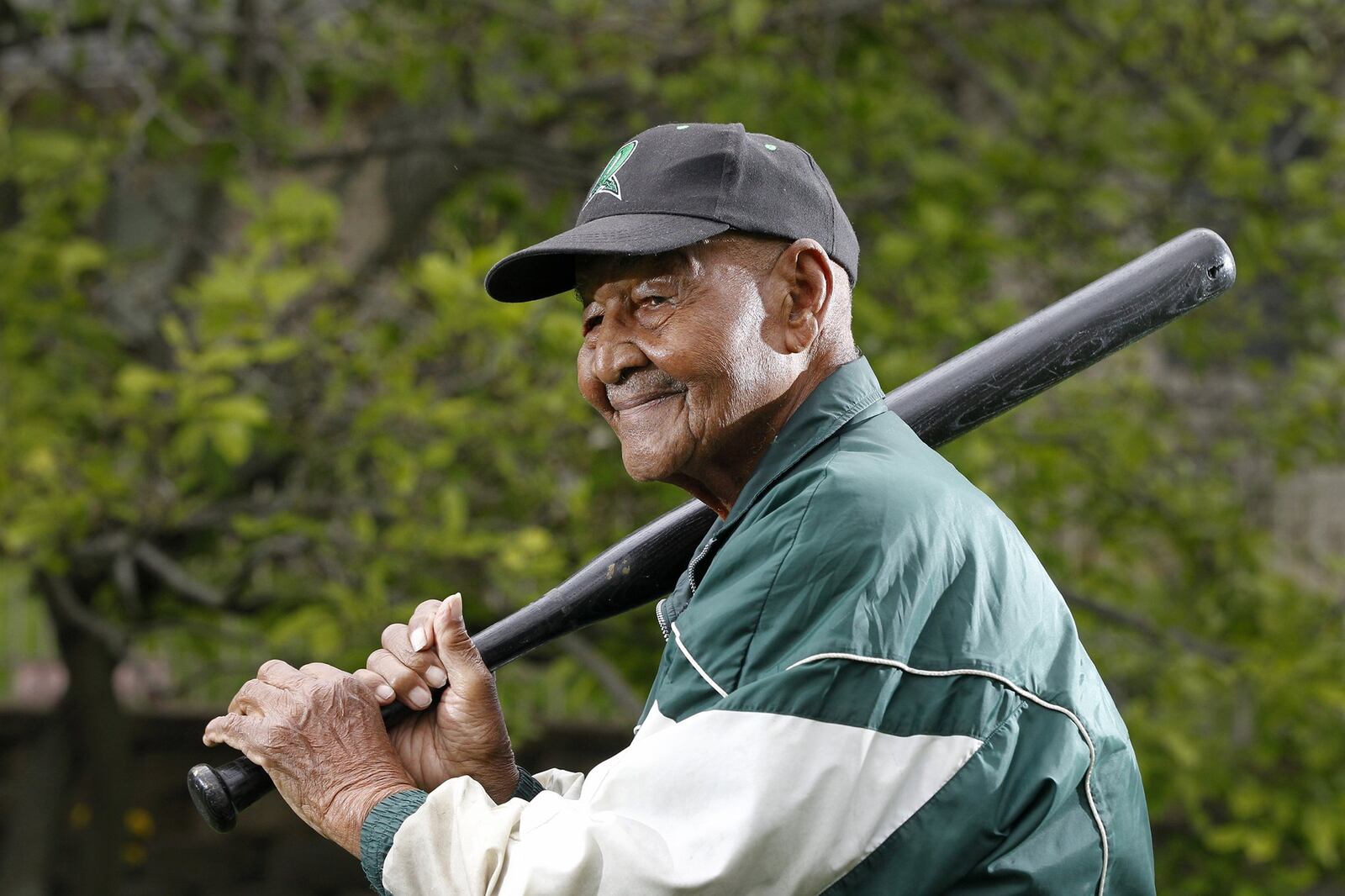 Nathaniel Lee Scott of Dayton celebrated his 100th birthday in March. Scott, who served in the Army and retired after 40 years with General Motors, is an avid baseball fan and will throw out the first pitch at an upcoming Dayton Dragons game. LISA POWELL / STAFF