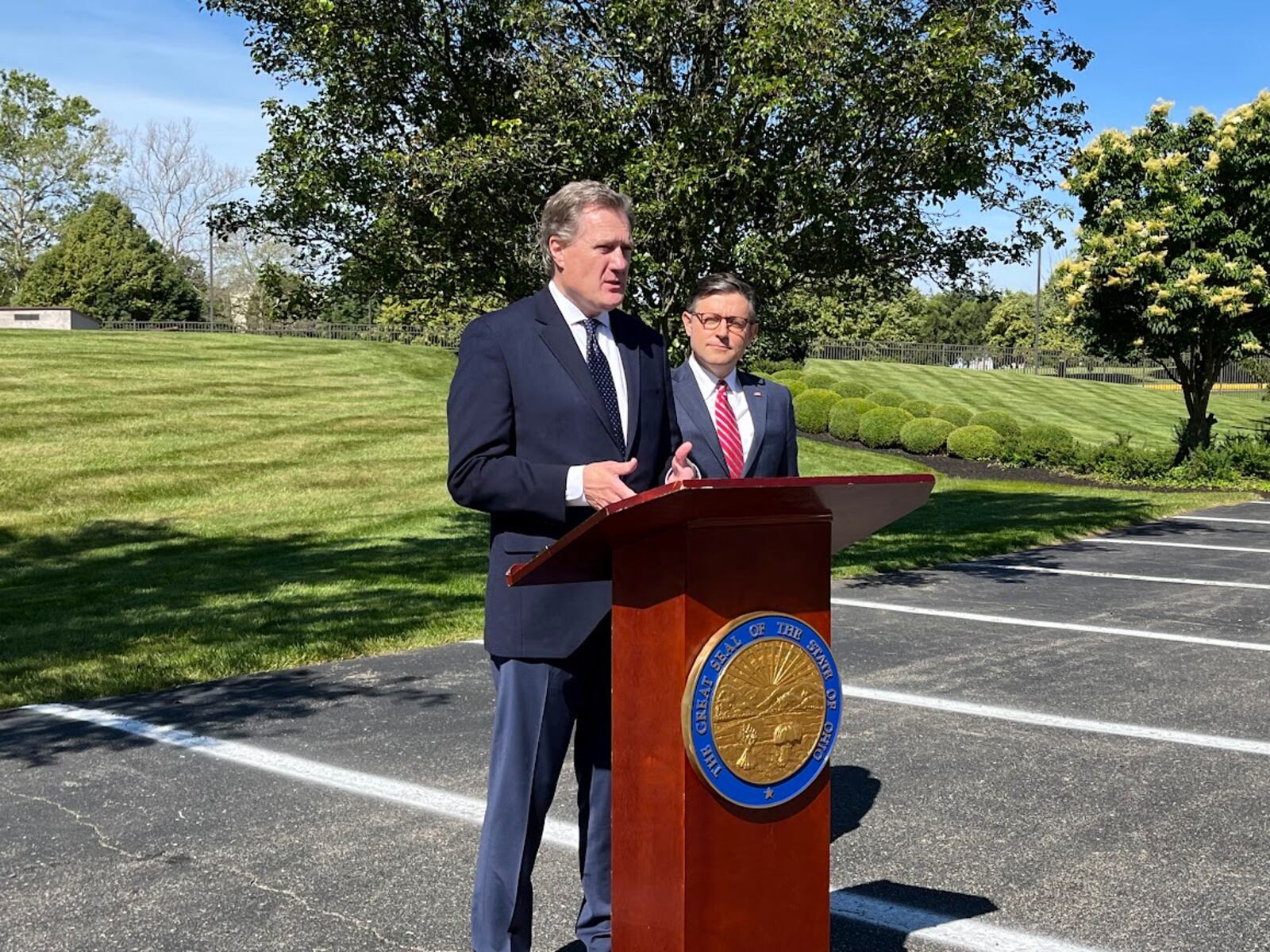 U.S. Rep. Mike Turner, R-Dayton, at the podium, with Speaker of the House Mike Johnson outside the Hope Hotel and Conference Center Friday. THOMAS GNAU/STAFF