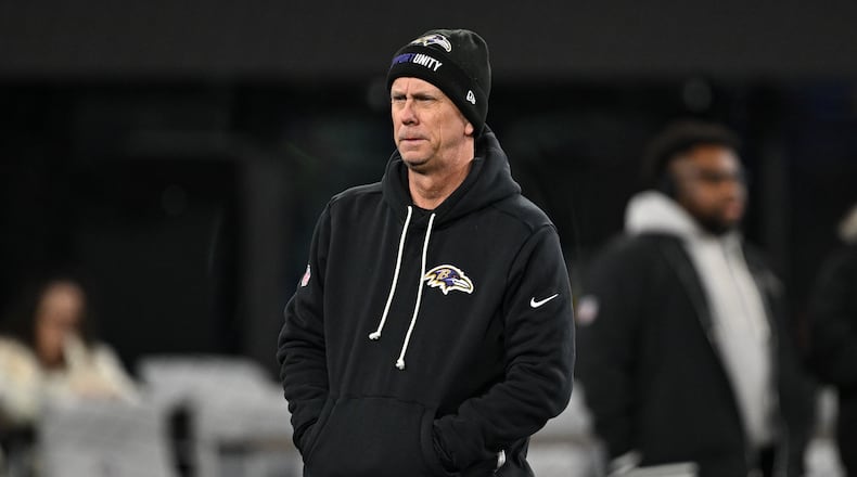 FILE - Baltimore Ravens offensive coordinator Todd Monken looks on during pre-game warm-ups before an NFL football game against the New England Patriots, Sunday, Dec. 21, 2025, in Baltimore. (AP Photo/Terrance Williams, File)