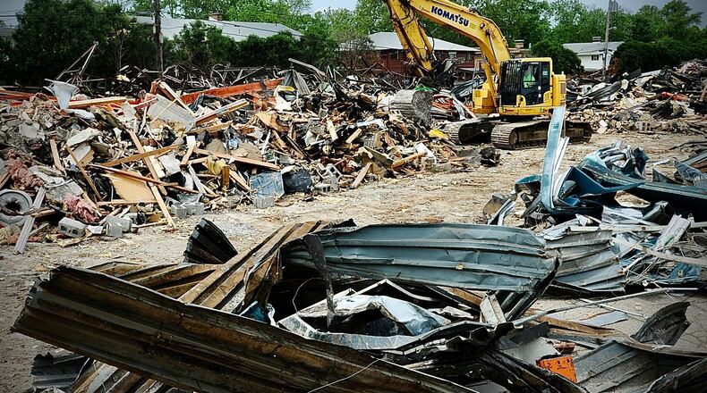 Demolition has started on parts of the Town and Country Shopping Center Monday May 23, 2022. MARSHALL GORBY\STAFF