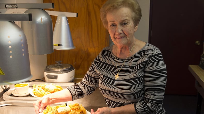 Sue Cheramie, owner and chef at Leeville Seafood Restaurant, prepares a seafood platter, Leeville, La. (Dave G. Houser/TNS)
