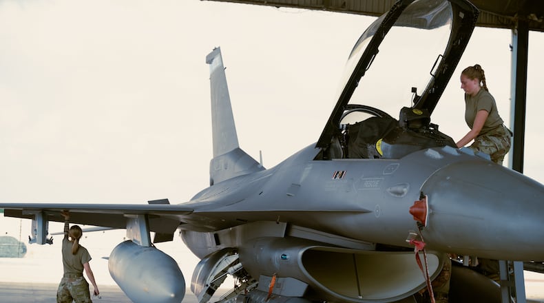 U.S. Air National Guard Staff Sgt. Lydia Bennis, right, and Airman 1st Class Leana Ruggles, both 179th Expeditionary Fighter Wing crew chiefs, conduct post flight maintenance and checks during Tarang Shakti 24 at Jodhpur Air Force Station, Rajasthan, India, Sept. 5, 2024. (U.S. Air Force photo by Master Sgt. Natasha Stannard)