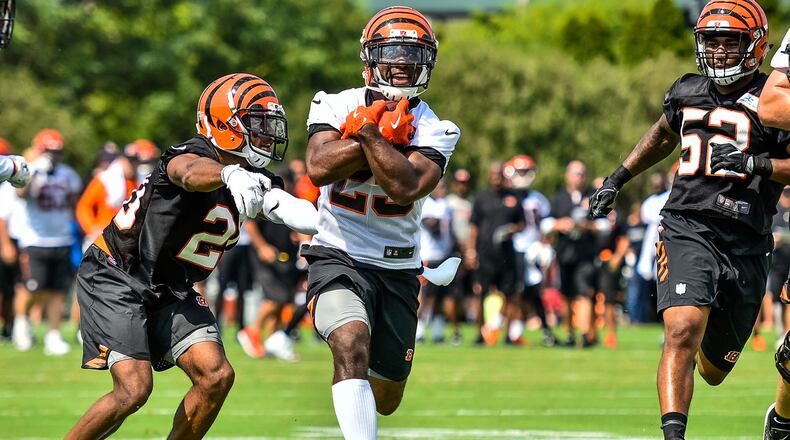 Running back Giovani Bernard carries the ball during the first day of Cincinnati Bengals Training Camp Friday, July 28 at the practice fields beside Paul Brown Stadium in Cincinnati. NICK GRAHAM/STAFF