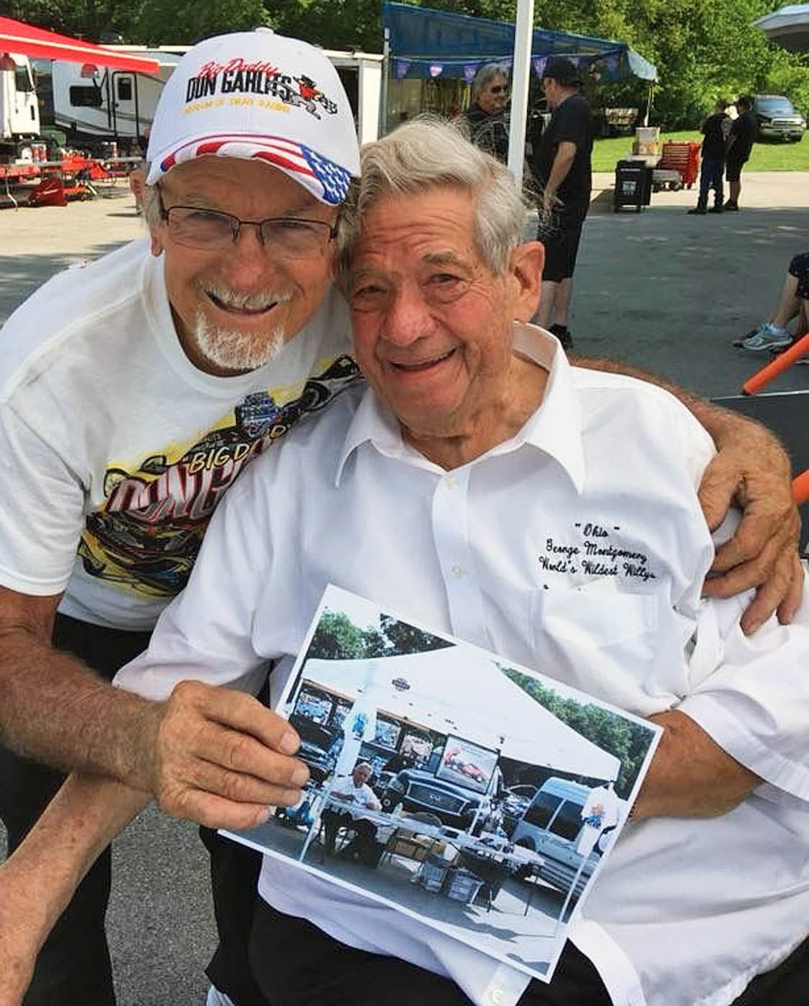 "Ohio George" Montgomery gets a hug from his buddy, fellow Hall of Famer and drag racing legend Don Garlits. CONTRIBUTED