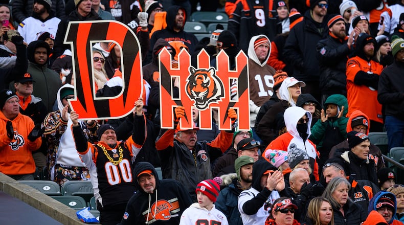 Cincinnati Bengals fans hold up a defense sign during game against the Cleveland Browns on Sunday, Jan. 4, 2026 at Paycor Stadium. JEREMY MILLER / CONTRIBUTED PHOTO