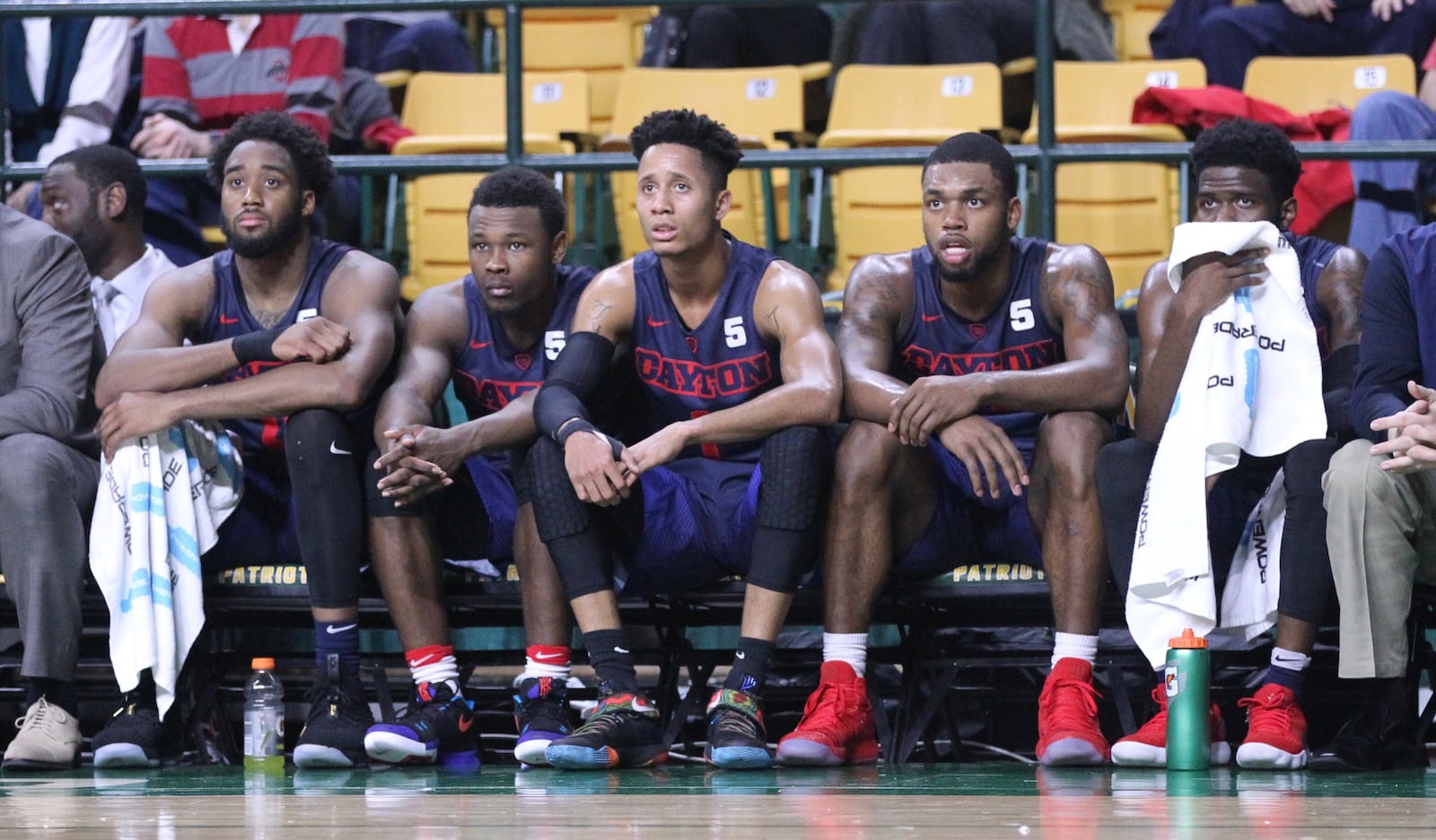 Dayton’s starters watch the game from the bench in the final minutes against George Mason on Wednesday, Feb. 14, 2018, at EagleBank Arena in Fairfax, Va. David Jablonski/Staff