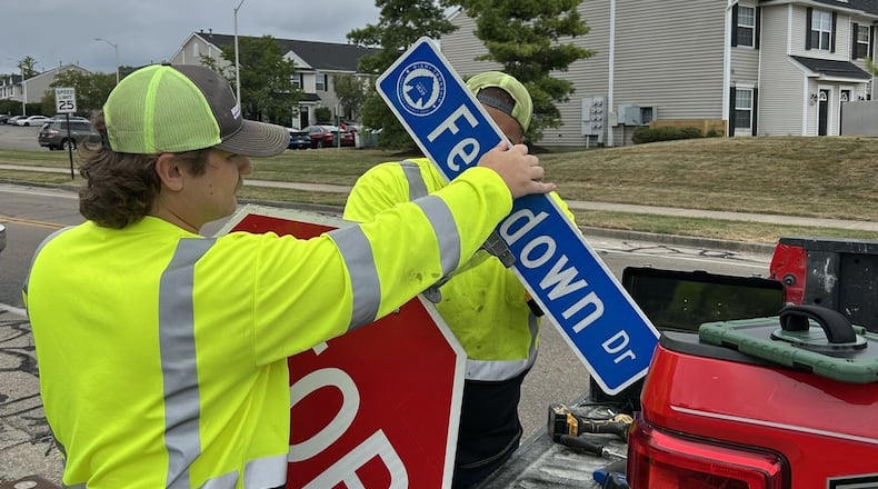 Miami Twp. Public Works employees install new, more visible street signs Thursday, Aug 21, 2025. Nearly 1,000 signs are being replaced on township-maintained streets, but not Ohio Department of Transportation or Montgomery County signs. CONTRIBUTED