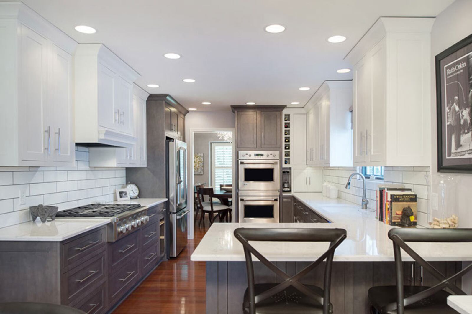 Contractors are now frequently asked to knock down walls and create more open kitchen layouts. (Craftsmen Home Improvements)