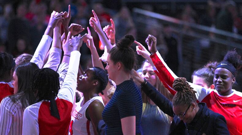 Dayton huddles before a game against Duquesne on Jan. 31, 2018, at UD Arena.