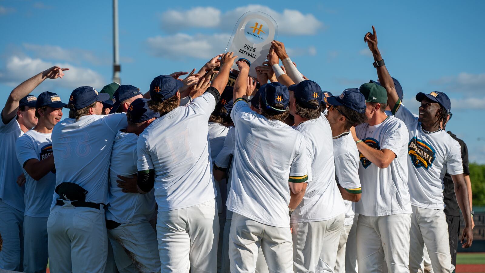 The Wright State University baseball team hoists the trophy after beating Milwaukee to win the Horizon League Conference Tournament on Saturday, May 24 at Nischwitz Stadium in Fairborn. WRIGHT STATE ATHLETICS / CONTRIBUTED PHOTO