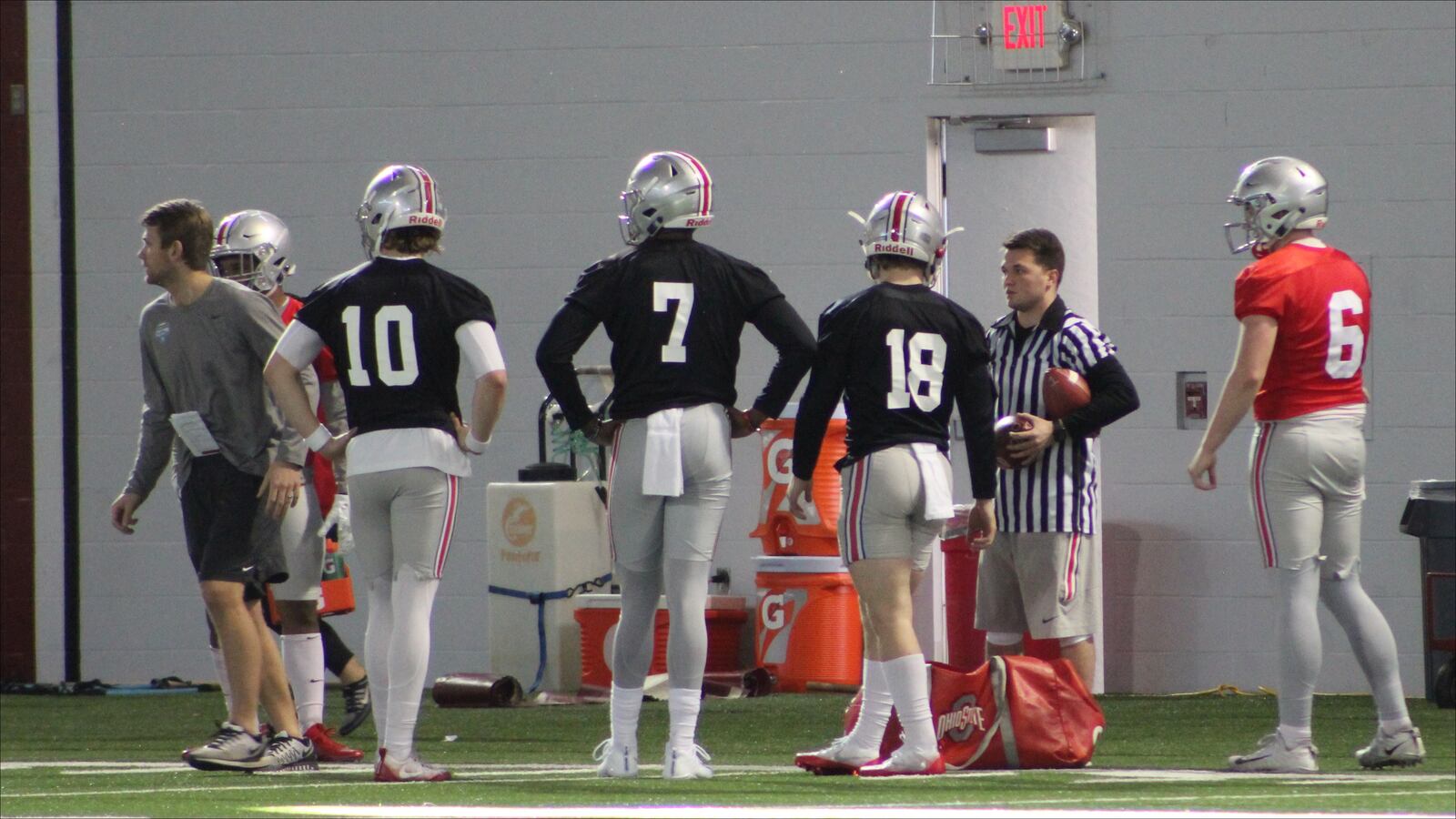 Joe Burrow (10), Dwayne Haskins (7) and Tate Martell (18) are in the mix to be Ohio State's starting quarterback in 2018. (Ryan Donnelly/Land of 10)