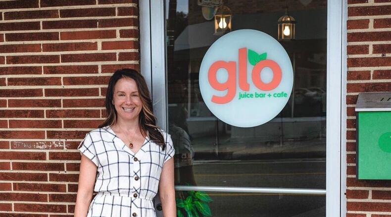 Amy Beaver, owner of Butter Cafe and Glo Juice Bar on Brown Street in Dayton, has signed on early to be part of "937 Delivers," a local co-op meal-delivery service. CONTRIBUTED
