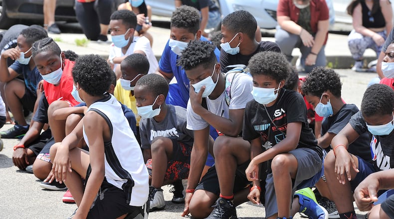 Freedom Schools scholars, their families, and staff joined together for singing, cheers and chants in celebration of Juneteenth at the Richard Allen School in 2020. MARSHALL GORBY\STAFF