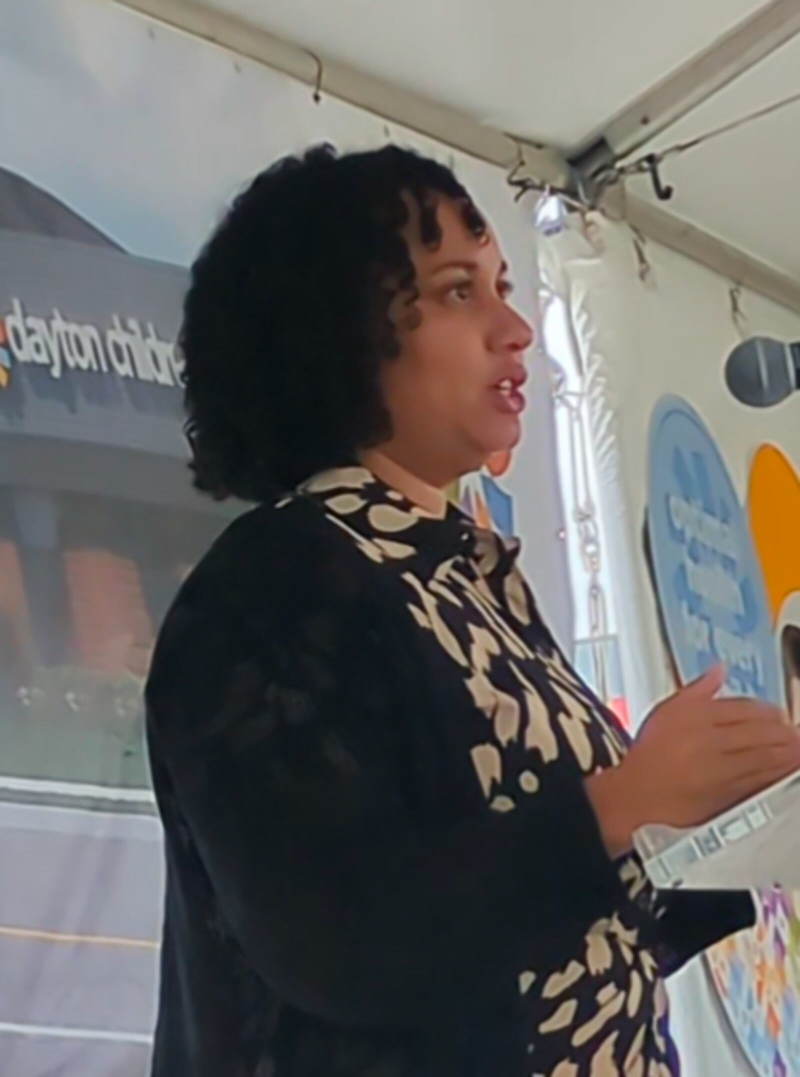 Shaiyanne Myrick, a mother and community member in West Dayton, talks about the impact a new Dayton Children's urgent care will have on families in the area on May 2, 2025. SAM WILDOW/STAFF