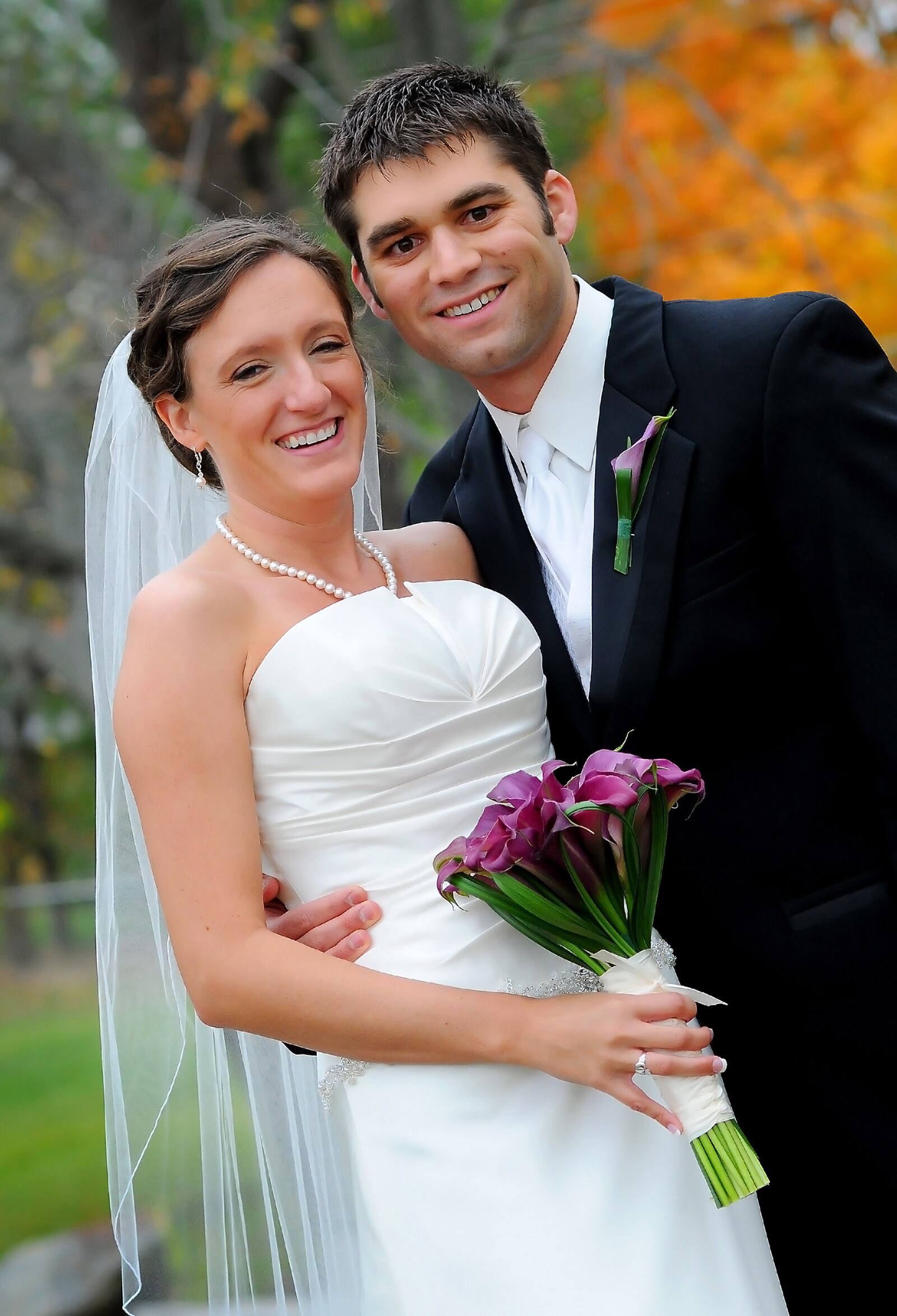 Courtney, right, and Phillip Hartke were married in 2010. They met while working at the Coldwater Cafe in Tipp City while in college. CONTRIBUTED