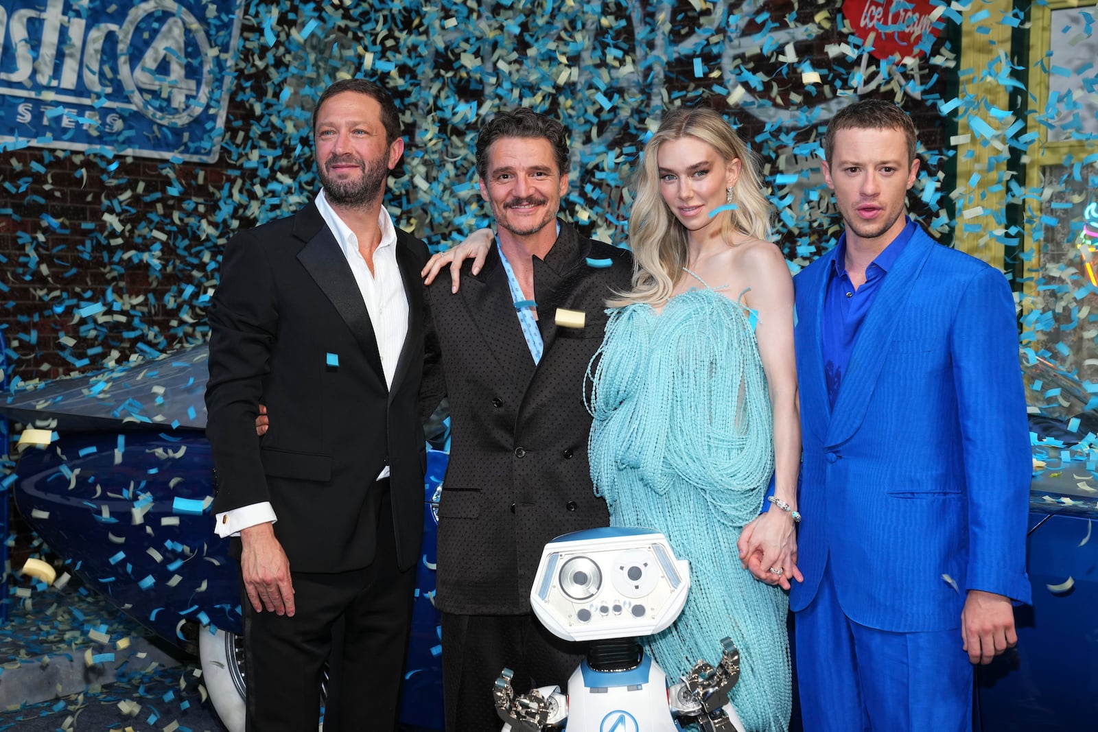 Ebon Moss-Bachrach, from left, Pedro Pascal, Vanessa Kirby and Joseph Quinn pose for photographers upon arrival at the launch event of the film 'Fantastic Four First Steps' on Thursday, July 10, 2025, in London. (Photo by Scott A Garfitt/Invision/AP)