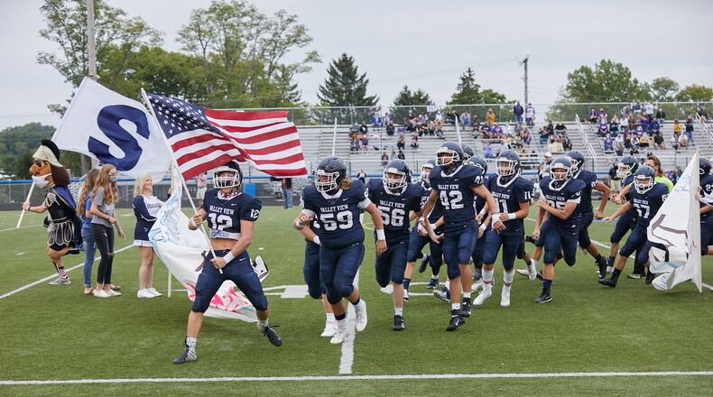 Valley View football players celebrate on Niswonger Field, named for three-time state champion coach Jay Niswonger. Photo credit: Photography by Woods