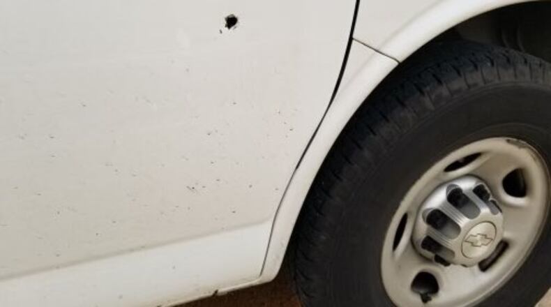 A bullet went through the front passenger door of a white 2014 Chevrolet Express van during an apparent road rage incident Friday, July 16, 2021, on southbound Interstate 71 in Warren County. The other vehicle involved was a white Scion xB with Kentucky license plates, which has not been located.