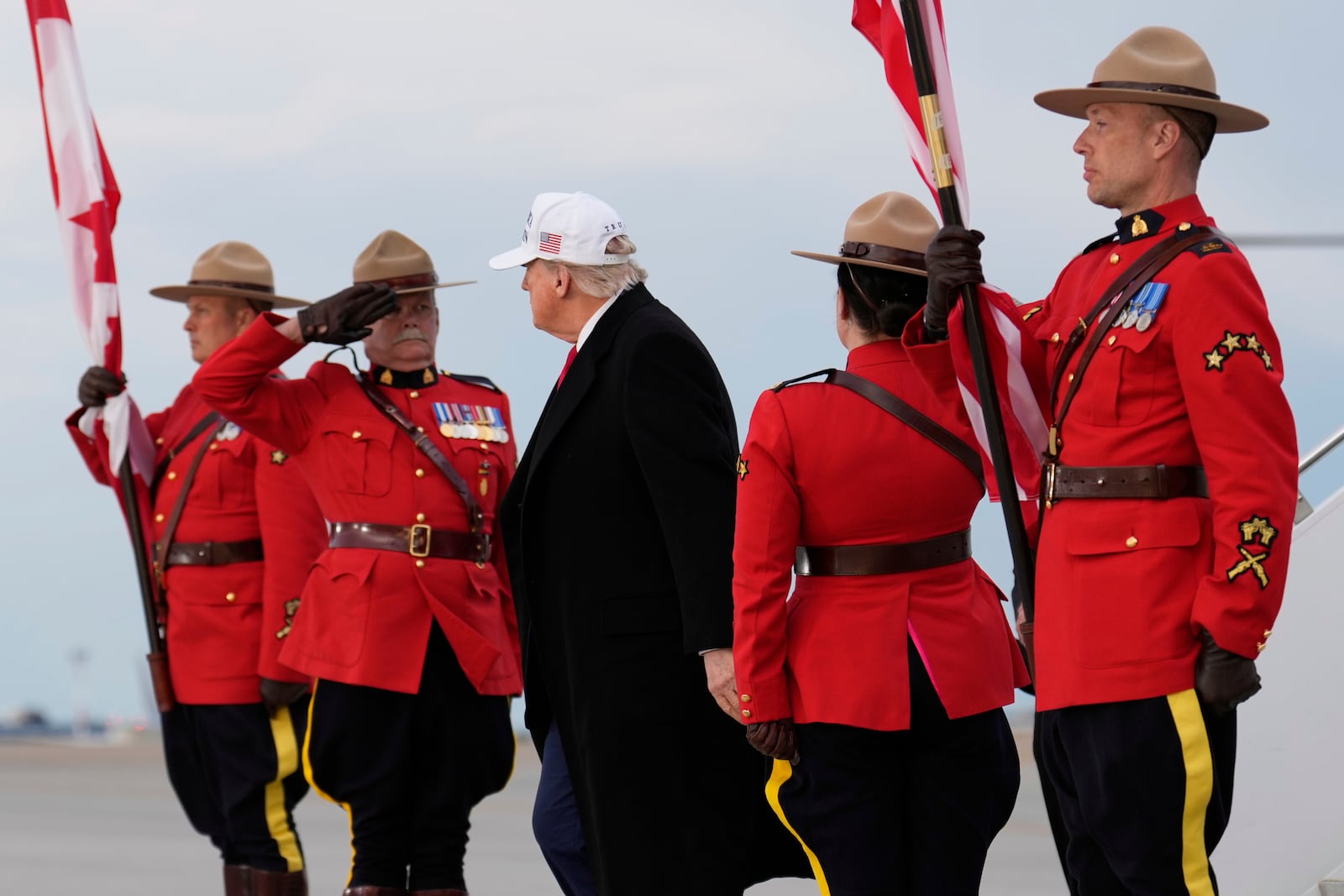 President Donald Trump arrives on Air Force One at Calgary International Airport, Sunday, June 15, 2025, in Calgary, Canada, ahead of the G7 Summit. (AP Photo/Mark Schiefelbein)
