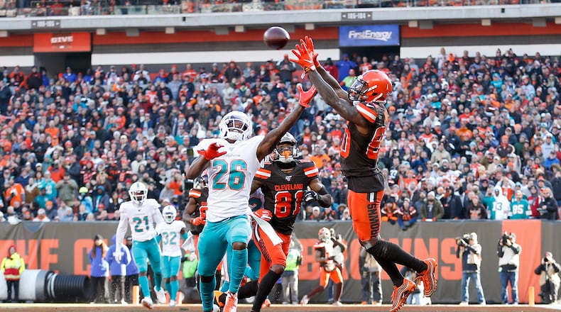 CLEVELAND, OH - NOVEMBER 24: Jarvis Landry #80 of the Cleveland Browns catches a pass for a touchdown over the defense of Steven Parker #26 of the Miami Dolphins during the second quarter at FirstEnergy Stadium on November 24, 2019 in Cleveland, Ohio. (Photo by Kirk Irwin/Getty Images)