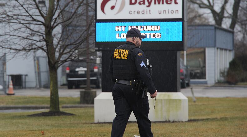 After a fraud call at DayMet Credit Union on Wagner Ford Road, a signal 99 call was dropped for officer assistance and multiple law enforcement agencies responded. A suspect ran away but an officer chased him and caught him Wednesday, Feb. 2, 2022. MARSHALL GORBY\STAFF