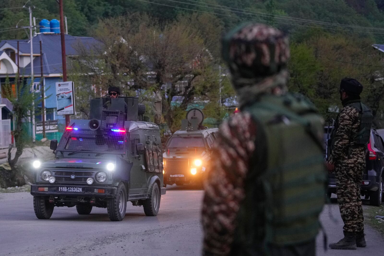Indian security officers patrol in armored vehicle near Pahalgam in south Kashmir after assailants indiscriminately opened fired at tourists visiting Pahalgam, Indian controlled Kashmir, Tuesday, April 22, 2025.(AP Photo/Dar Yasin)