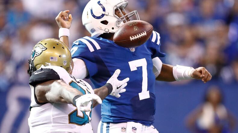 INDIANAPOLIS, IN - OCTOBER 22: Malik Jackson #97 of the Jacksonville Jaguars forces Jacoby Brissett #7 of the Indianapolis Colts to fumble during the fourth quarter at Lucas Oil Stadium on October 22, 2017 in Indianapolis, Indiana. (Photo by Andy Lyons/Getty Images)