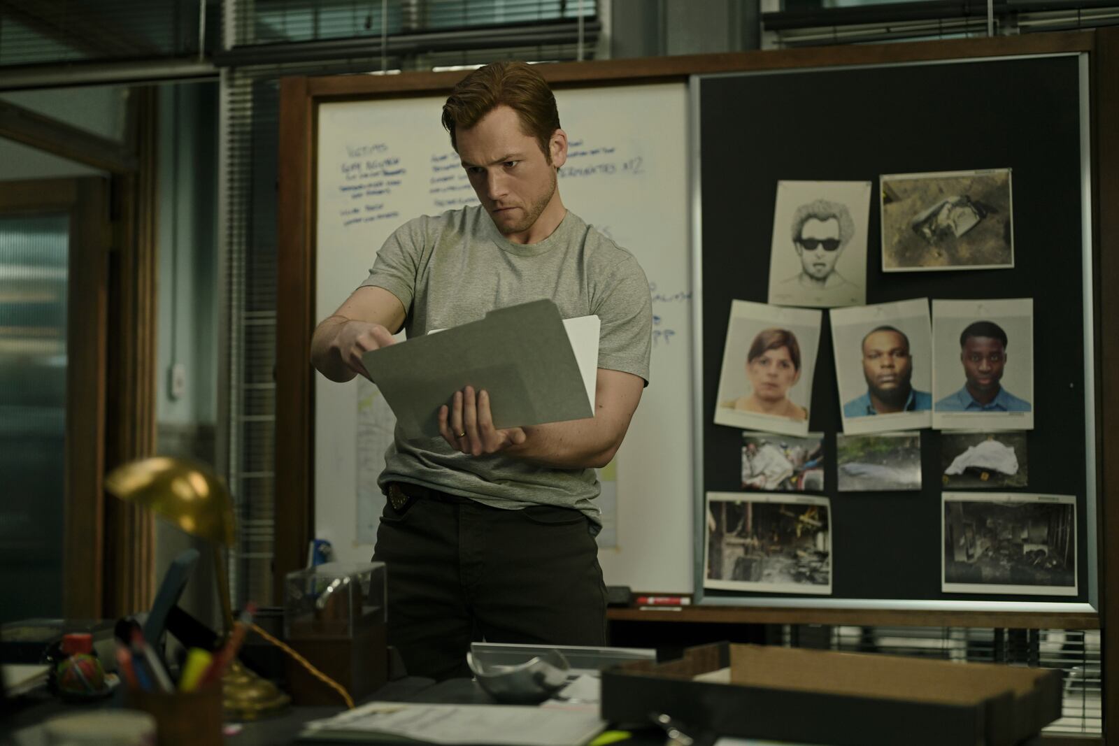 This image released by Apple TV+ shows Taron Egerton in a scene from "Smoke." (Apple TV+ via AP)