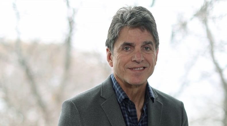 Mike Adamle poses for a photograph at his home Thursday, Nov. 16, 2017, in Evanston, Ill. (John J. Kim/Chicago Tribune/TNS)