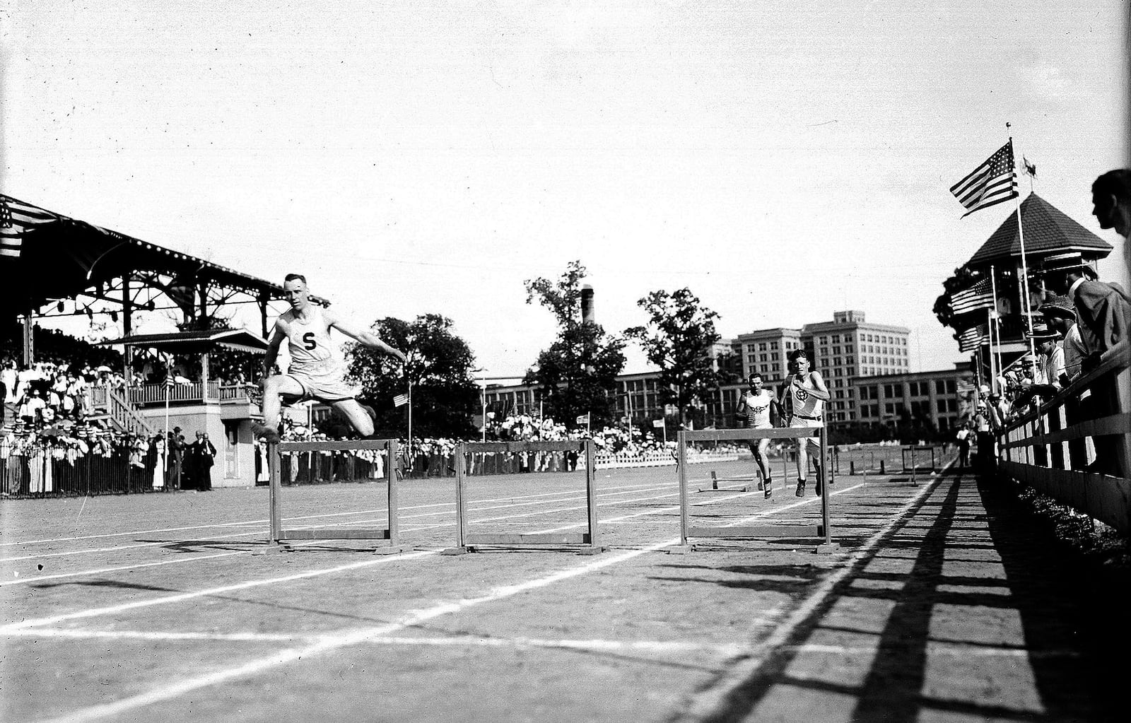 Men from various organizations race around the track at the Montgomery County Fairgounds during a Fourth of July celebration in 1913. NCR ARCHIVE