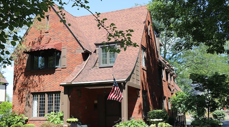 The brick house has about 3,310 sq. ft. of living space plus bonus rooms within the walk-out basement. There is a 2-car, attached garage. CONTRIBUTED PHOTOS BY KATHY TYLER