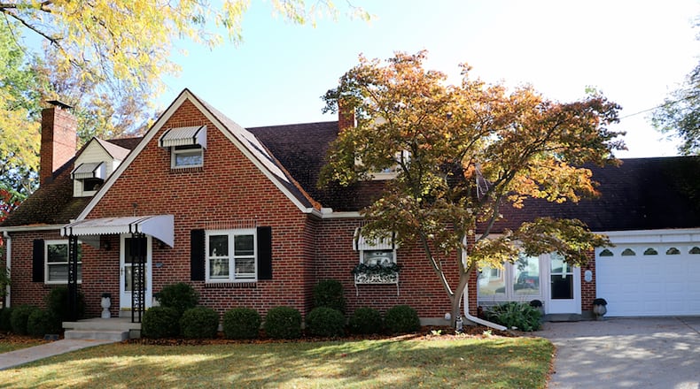 The renovated Cape Cod has an enclosed breezeway with built-in charcoal grill, 2 bedrooms and a full bath on the main level and a finished basement. CONTRIBUTED PHOTO BY KATHY TYLER