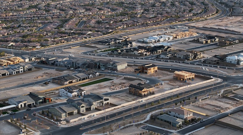 Homes are seen under construction Monday, Feb. 2, 2026, in Las Vegas. (AP Photo/John Locher)