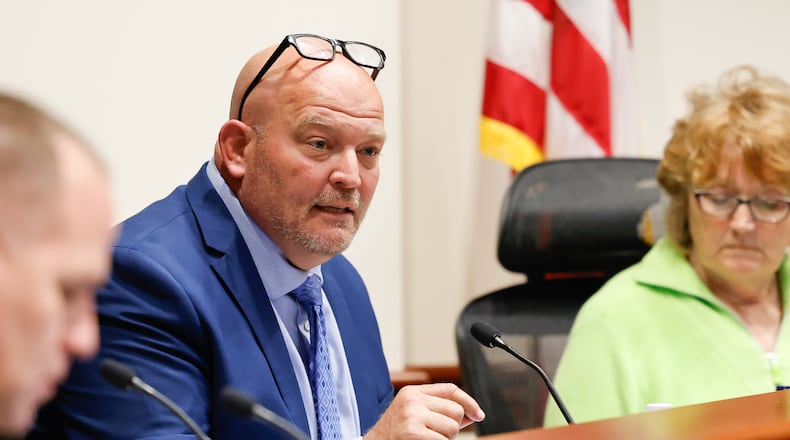 Hamilton City Council member Joel Lauer speaks out against the Miami Conservancy District's proposed assessment increases starting in 2025 during the council meeting on Wednesday, April 10, 2024, in Hamilton. NICK GRAHAM/STAFF