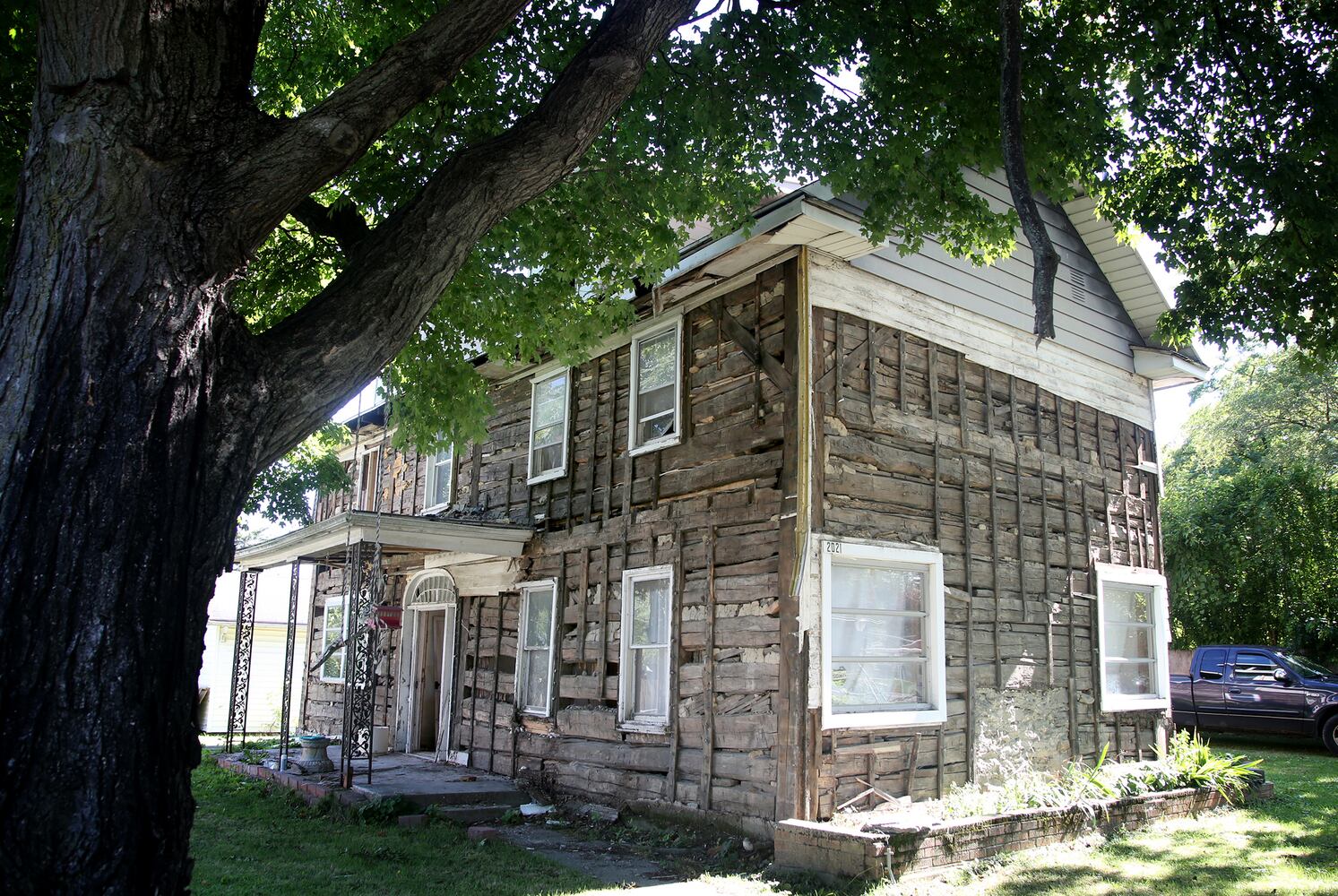 PHOTOS: Log home hidden for decades reveals Stanley gypsy family legend