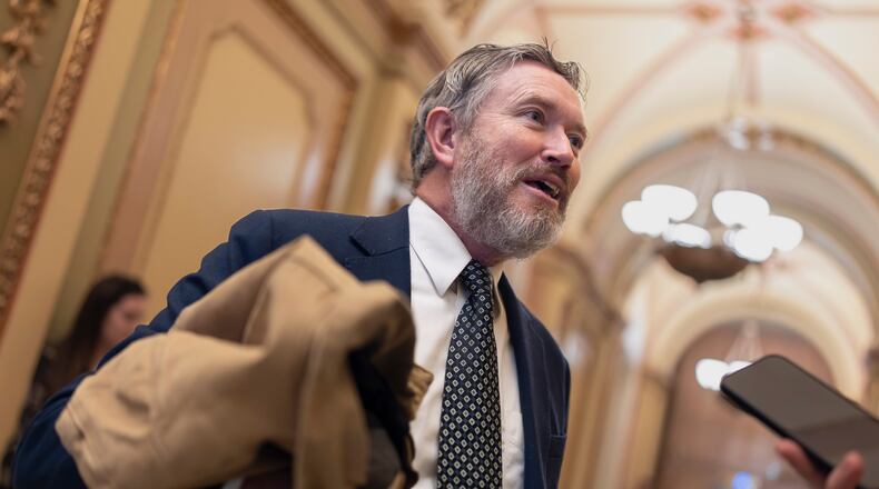 Rep. Thomas Massie, R-Ky., speaks outside the House chamber before the final votes of the week, at the Capitol in Washington, Friday, Dec. 12, 2025. (AP Photo/J. Scott Applewhite)