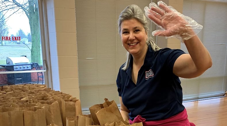 Gina Franz, operations specialist at the USO Center at Wright-Patterson Air Force Base, prepares coronavirus care packages March 19 to delivered to the 88th Medical Group. (Contributed photo)